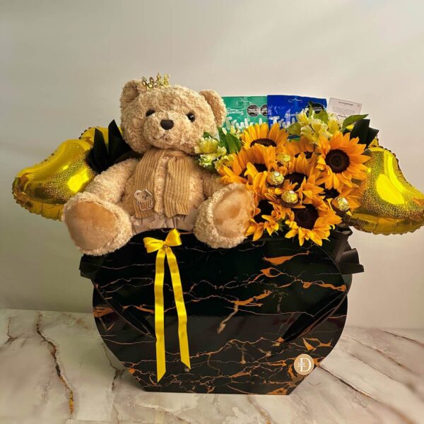 Arreglo floral con peluche y girasoles Rey Sol