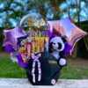 cesta con peluche, globos y chocolates surtidos para regalo en Caracas