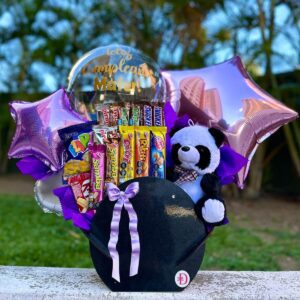 cesta con peluche, globos y chocolates surtidos para regalo en Caracas