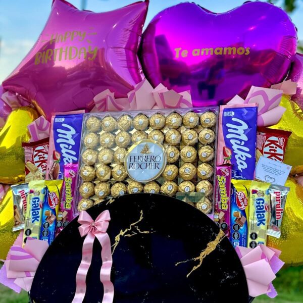 detalle de chocolates importados y nacionales junto a caja Ferrero